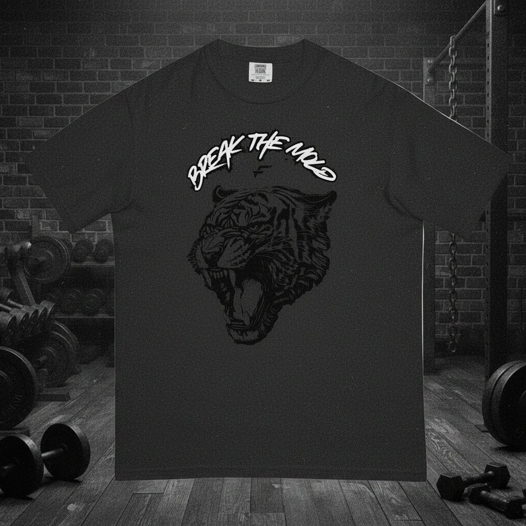 T-shirt front of the unisex  the gray graphic t-shirt with a tiger print and that says via text 'BREAK THE MOLD' designed by Fittwave Fitness Inc. a 501c3 non-profit based in Colorado Springs, Colorado. 